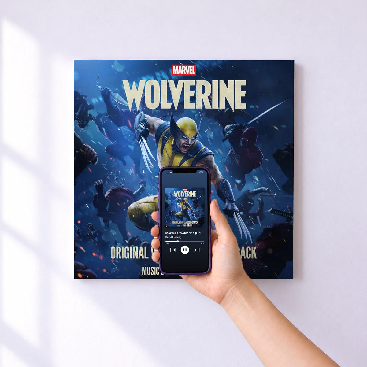 Affiche connectée Marvel's Wolverine (Original Video Game Soundtrack) de David Fleming au mur : l'album se lance en approchant le téléphone