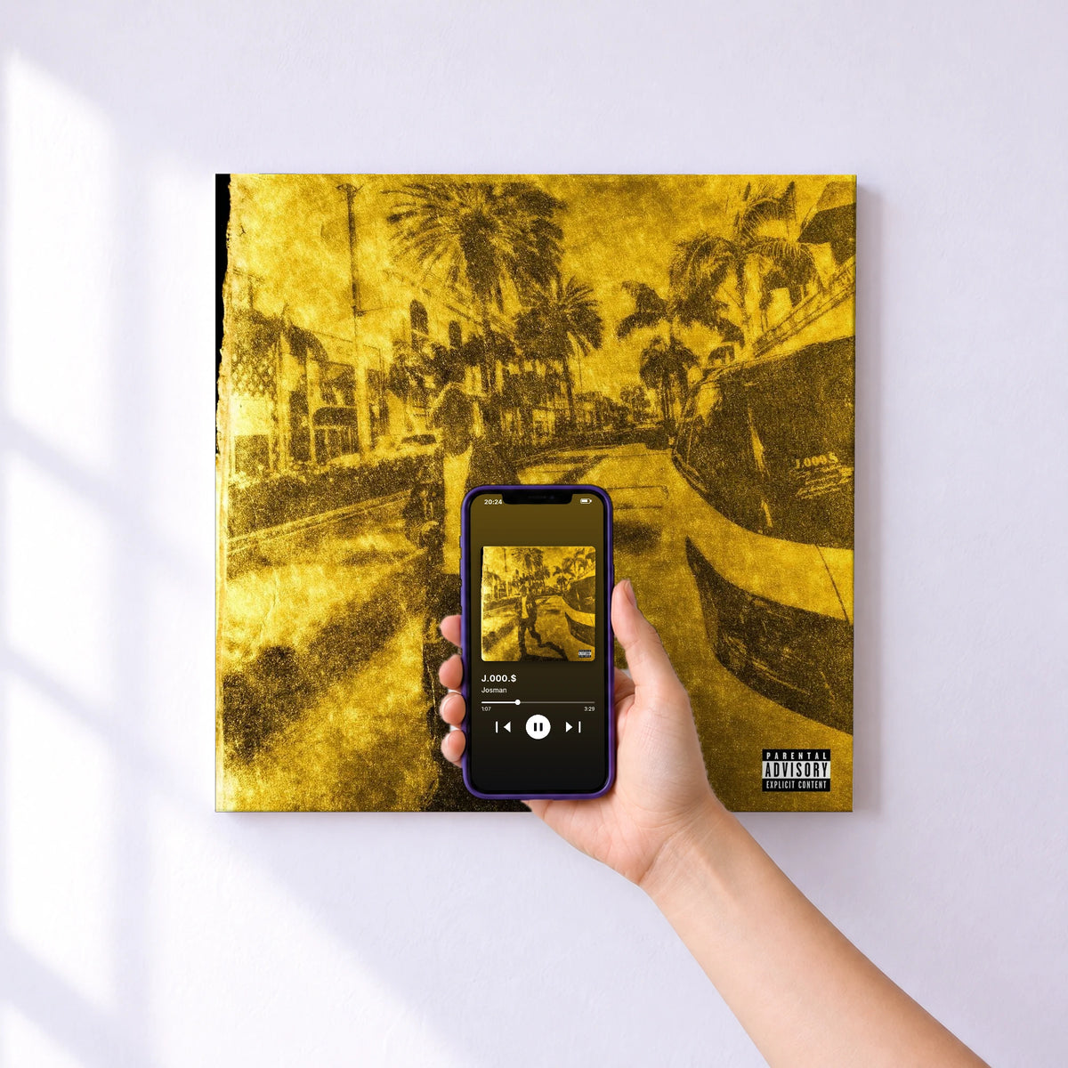 Affiche connectée J.000.$ de Josman au mur : l'album se lance en approchant le téléphone