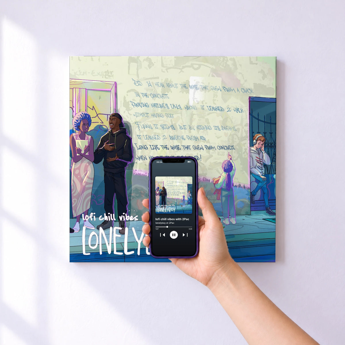 Affiche connectée lofi chill vibes with 2Pac de lonelyboy et 2Pac au mur : l'album se lance en approchant le téléphone