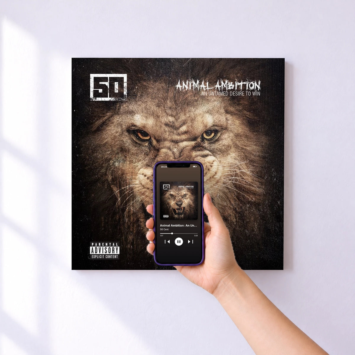 Affiche connectée Animal Ambition: An Untamed Desire To Win de 50 Cent au mur : l'album se lance en approchant le téléphone