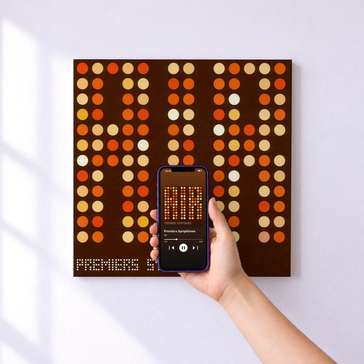 Affiche connectée Premiers Symptômes de Air au mur : l'album se lance en approchant le téléphone