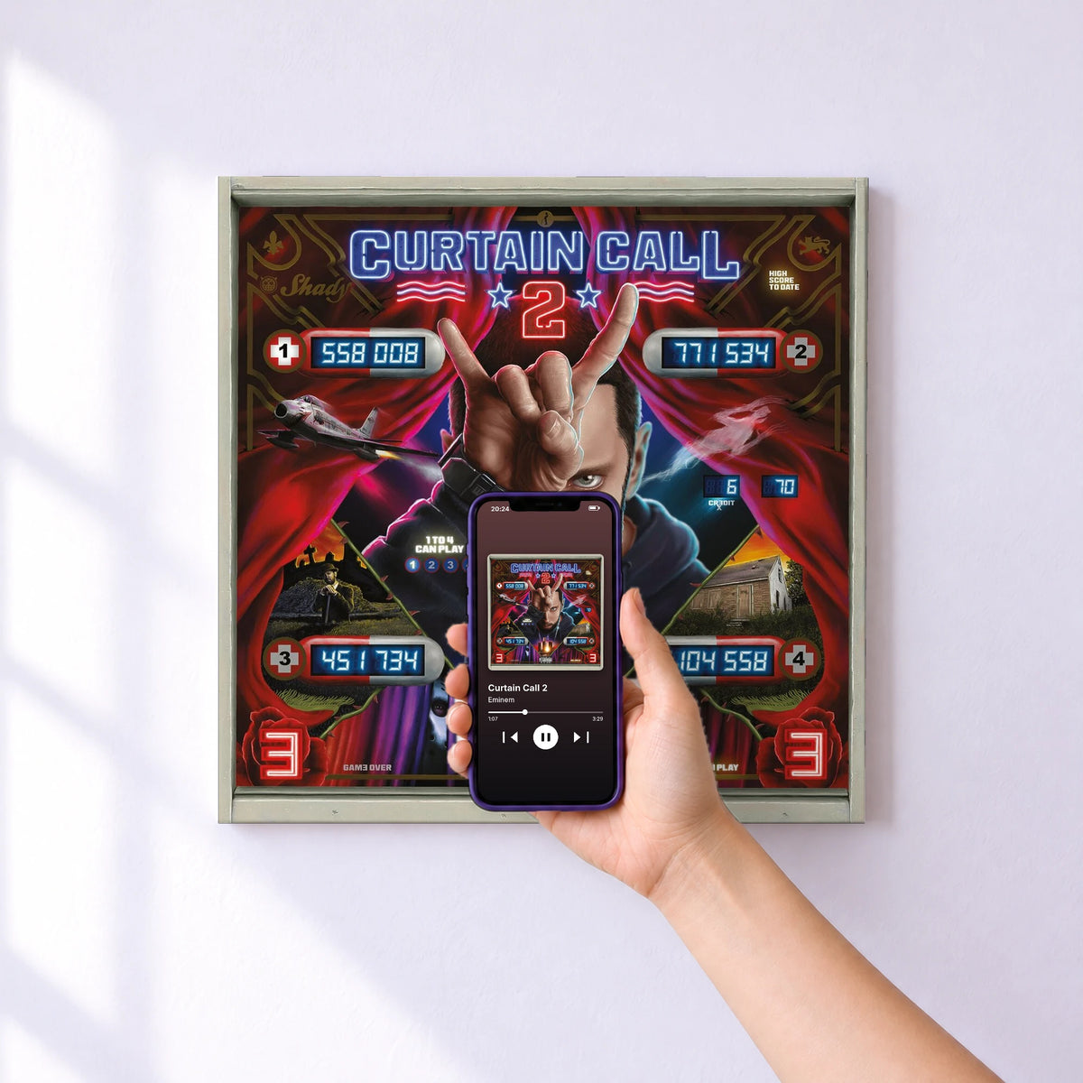 Affiche connectée Curtain Call 2 de Eminem au mur : l'album se lance en approchant le téléphone