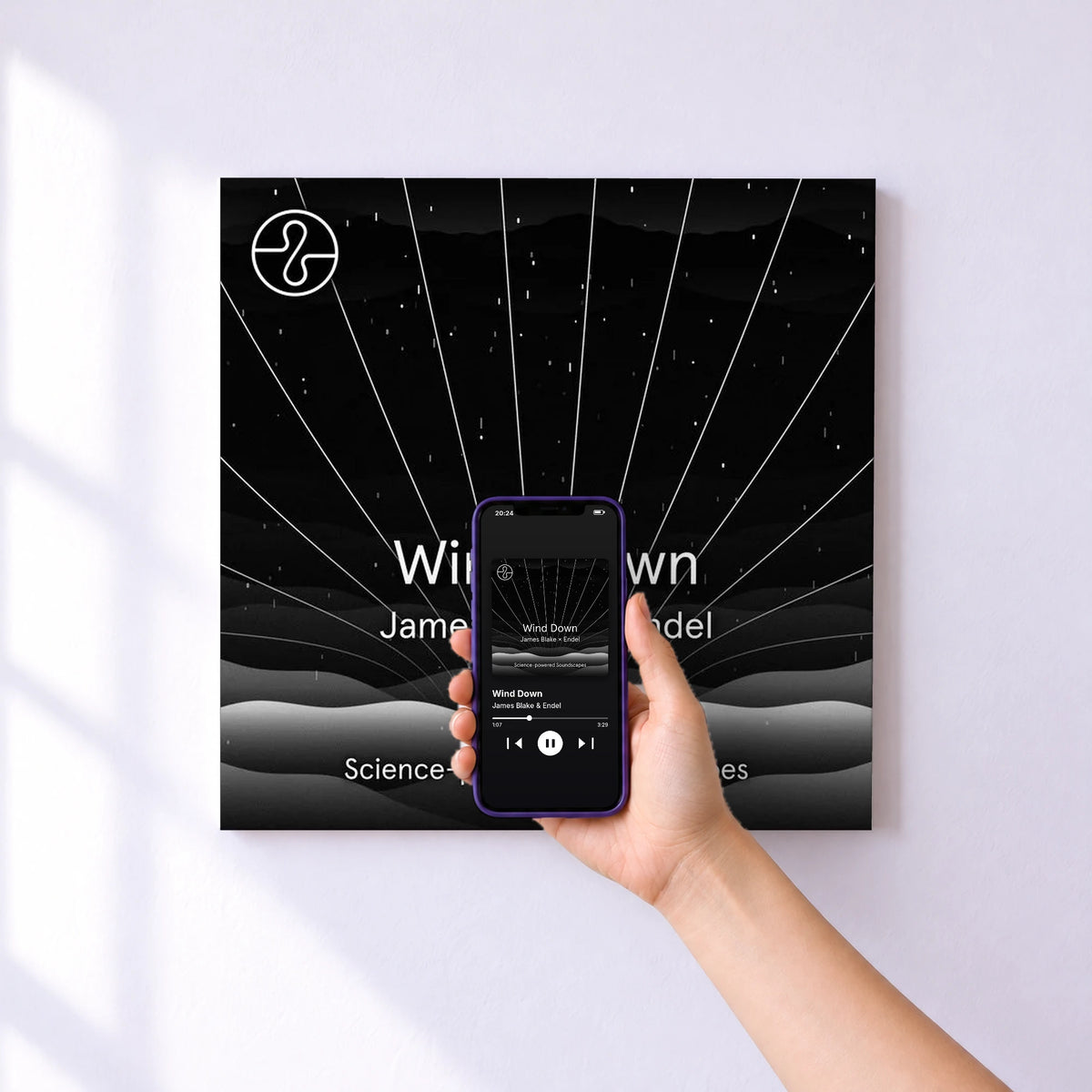 Affiche connectée Wind Down de James Blake & Endel au mur : l'album se lance en approchant le téléphone