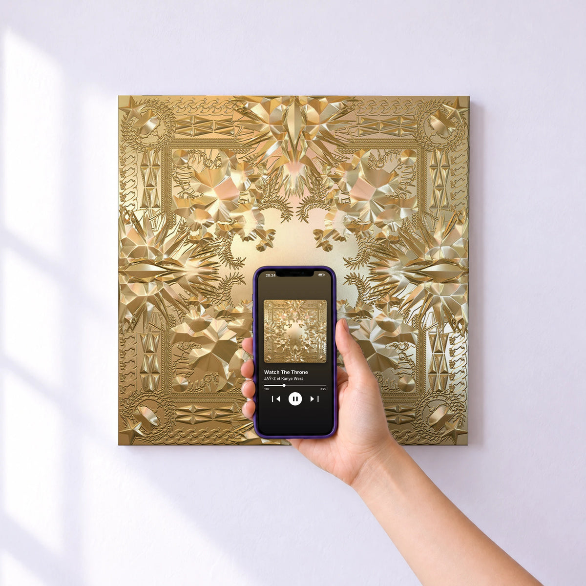 Affiche connectée Watch The Throne de JAŸ-Z et Kanye West au mur : l'album se lance en approchant le téléphone