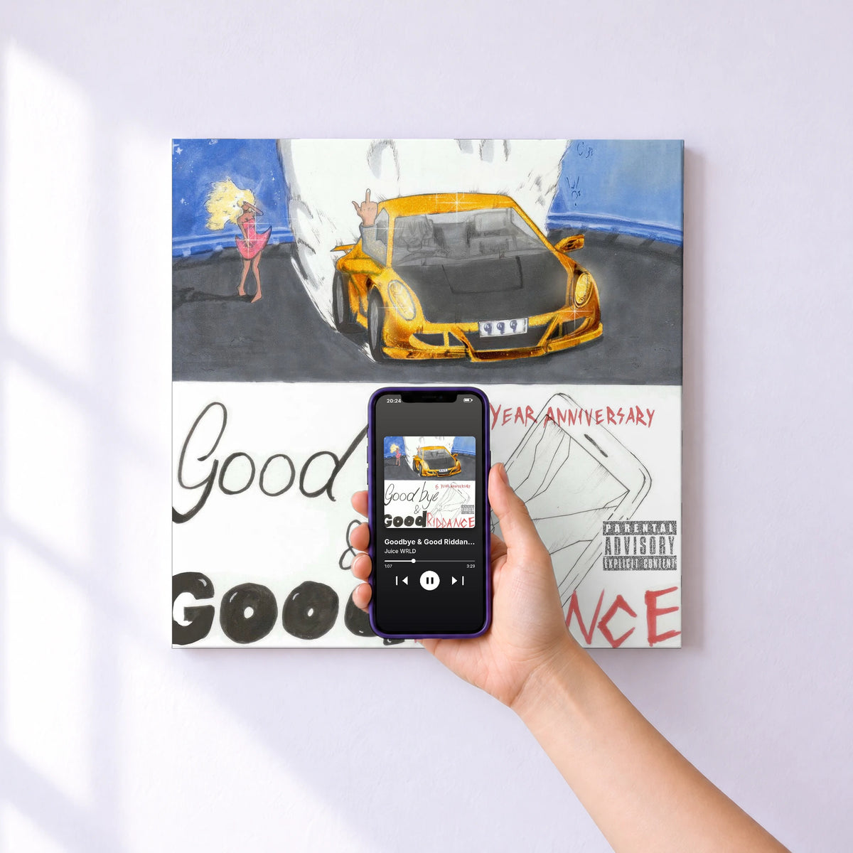 Affiche connectée Goodbye & Good Riddance (5 Year Anniversary Edition) de Juice WRLD au mur : l'album se lance en approchant le téléphone