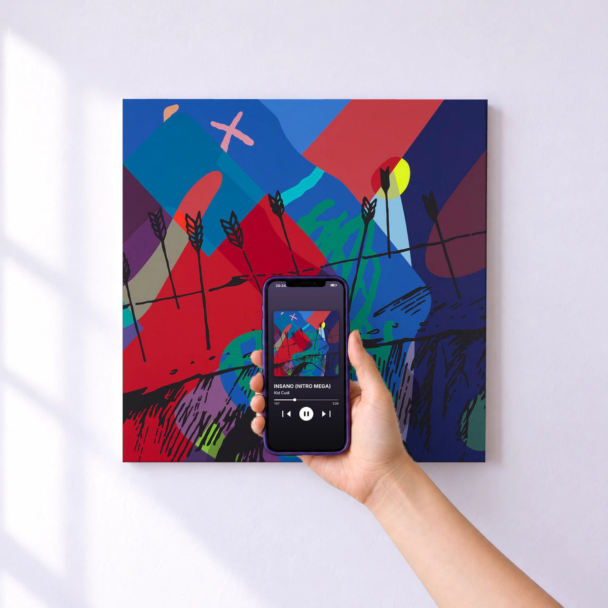 Affiche connectée INSANO (NITRO MEGA) de Kid Cudi au mur : l'album se lance en approchant le téléphone