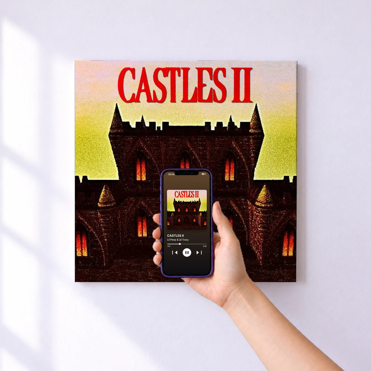Affiche connectée CASTLES II de Lil Peep & Lil Tracy au mur : l'album se lance en approchant le téléphone
