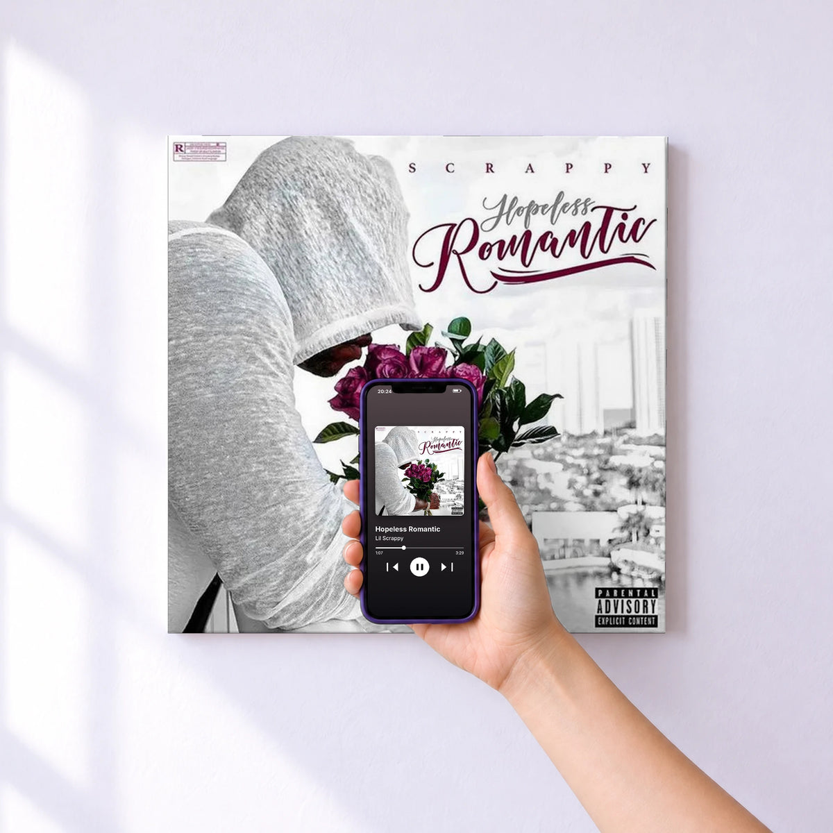 Affiche connectée Hopeless Romantic de Lil Scrappy au mur : l'album se lance en approchant le téléphone