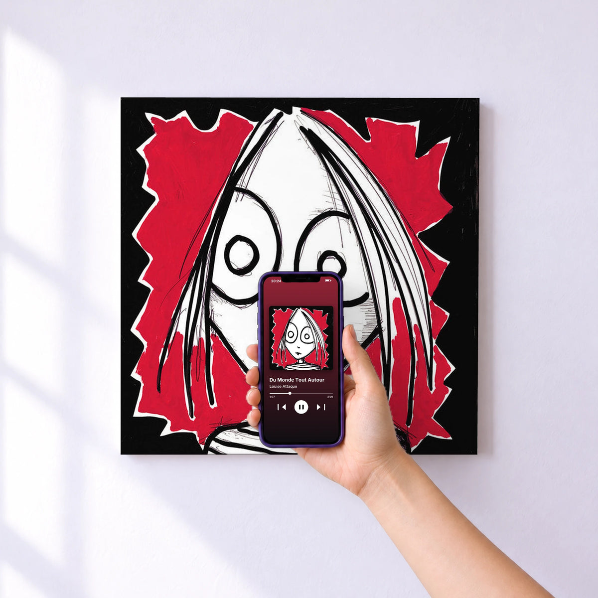 Affiche connectée Du Monde Tout Autour de Louise Attaque au mur : l'album se lance en approchant le téléphone