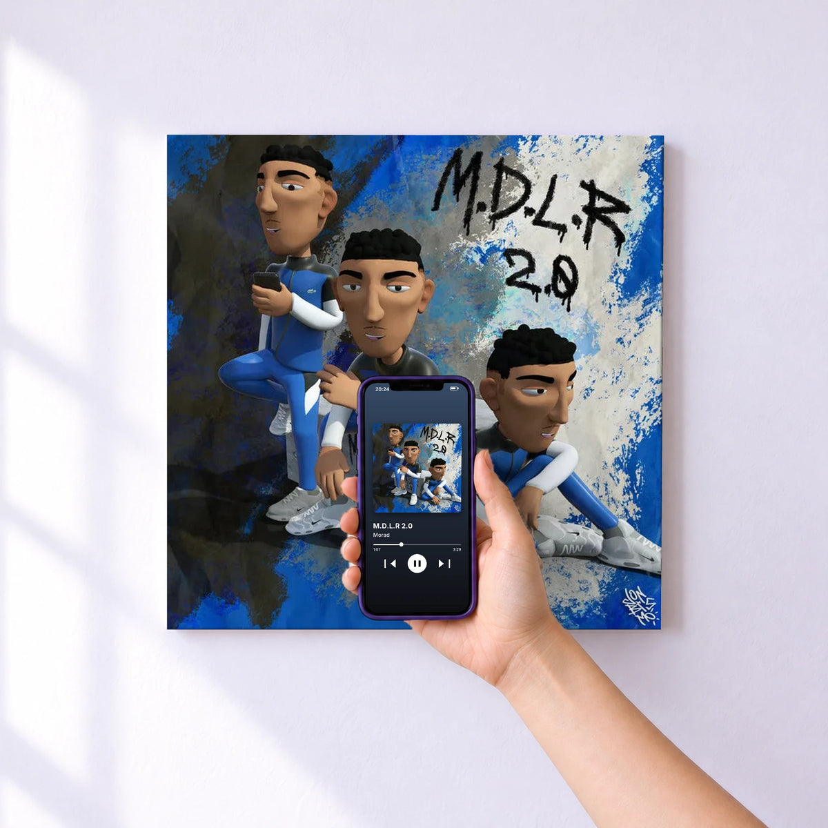 Affiche connectée M.D.L.R 2.0 de Morad au mur : l'album se lance en approchant le téléphone