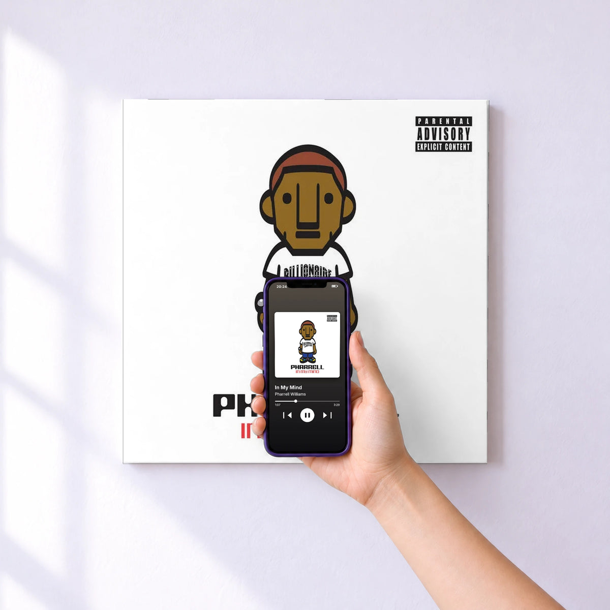 Affiche connectée In My Mind de Pharrell Williams au mur : l'album se lance en approchant le téléphone