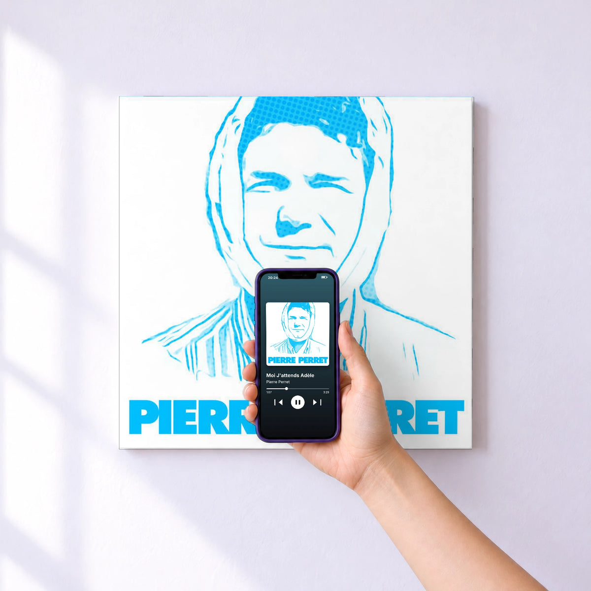Affiche connectée Moi J'attends Adèle de Pierre Perret au mur : l'album se lance en approchant le téléphone