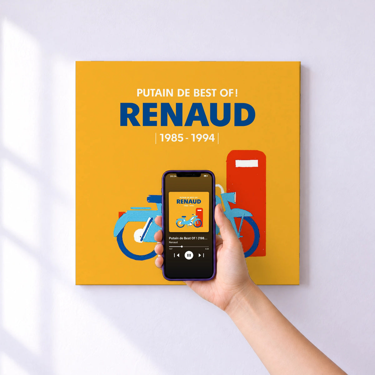 Affiche connectée Putain de Best Of ! (1985 - 1994) de Renaud au mur : l'album se lance en approchant le téléphone