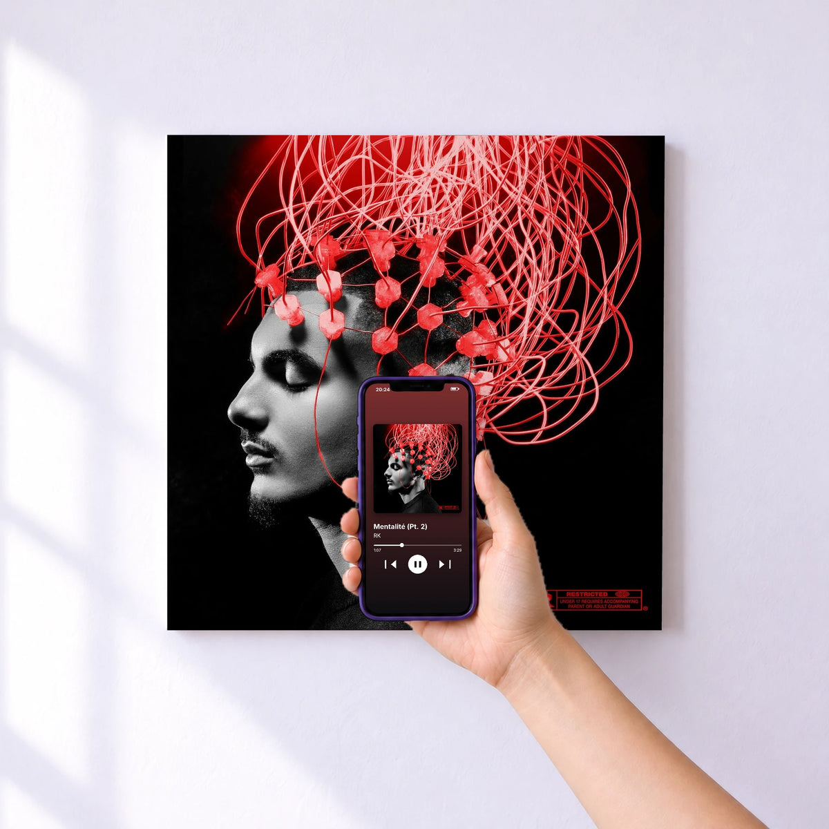 Affiche connectée Mentalité (Pt. 2) de RK au mur : l'album se lance en approchant le téléphone