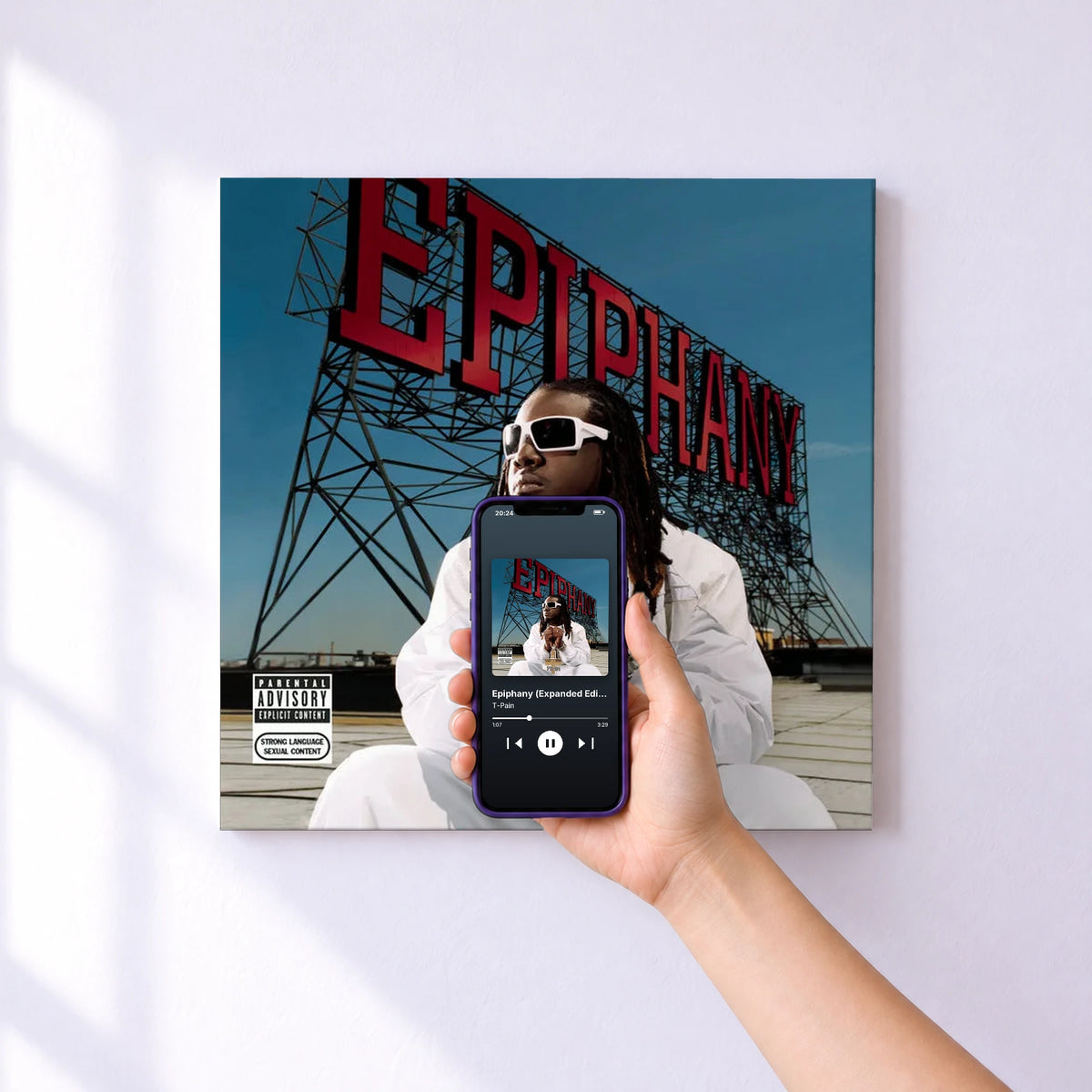 Affiche connectée Epiphany (Expanded Edition) de T-Pain au mur : l'album se lance en approchant le téléphone