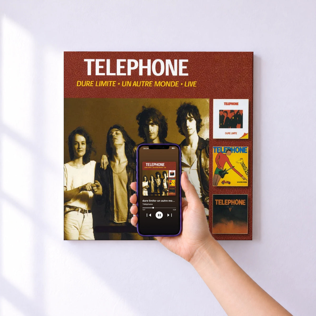 Affiche connectée dure limite-un autre monde-le live de Téléphone au mur : l'album se lance en approchant le téléphone