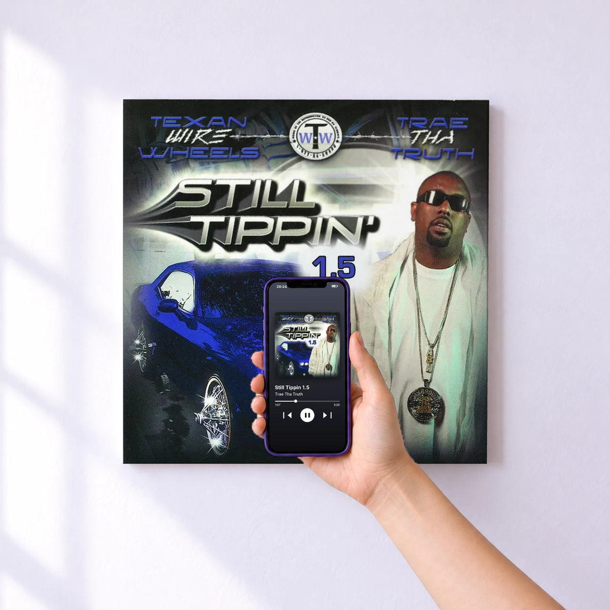 Affiche connectée Still Tippin 1.5 de Trae Tha Truth au mur : l'album se lance en approchant le téléphone