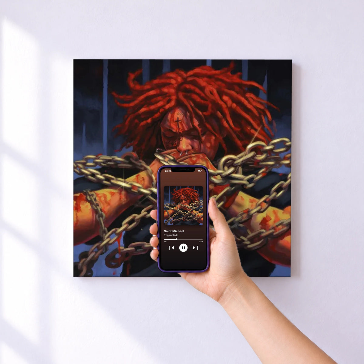 Affiche connectée Saint Michael de Trippie Redd au mur : l'album se lance en approchant le téléphone