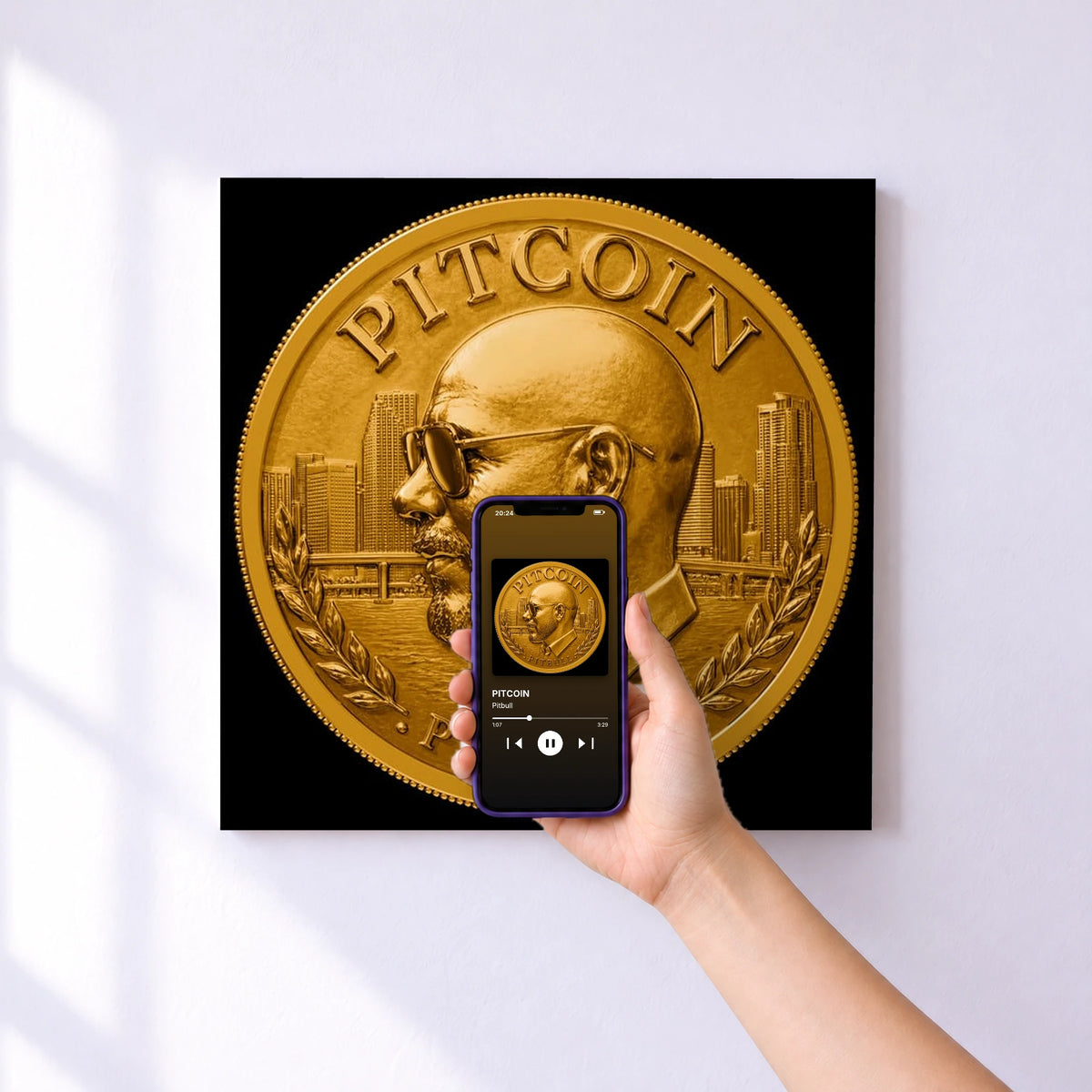 Affiche connectée PITCOIN de Pitbull au mur : l'album se lance en approchant le téléphone
