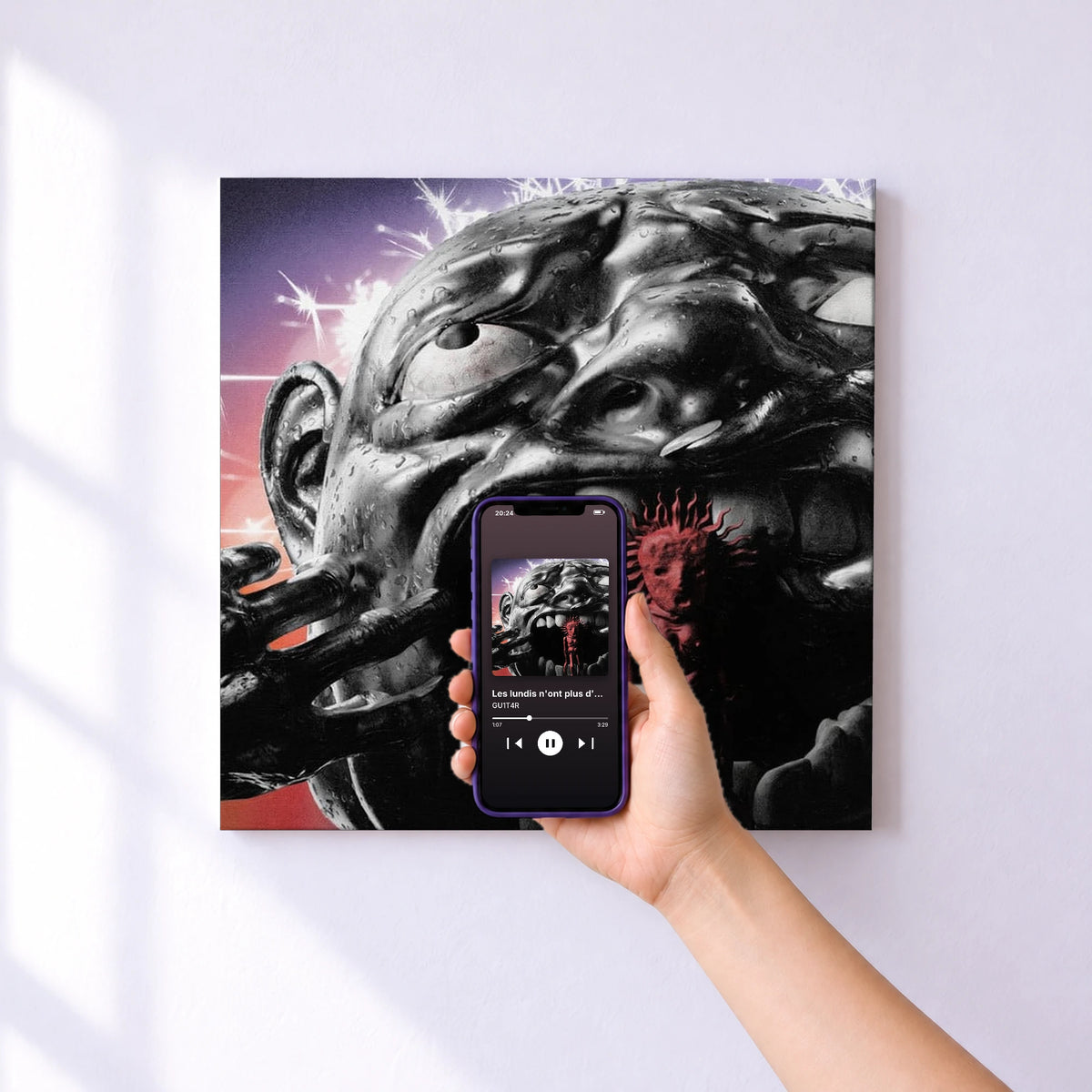 Affiche connectée Les lundis n'ont plus d'couleurs de GU1T4R au mur : l'album se lance en approchant le téléphone