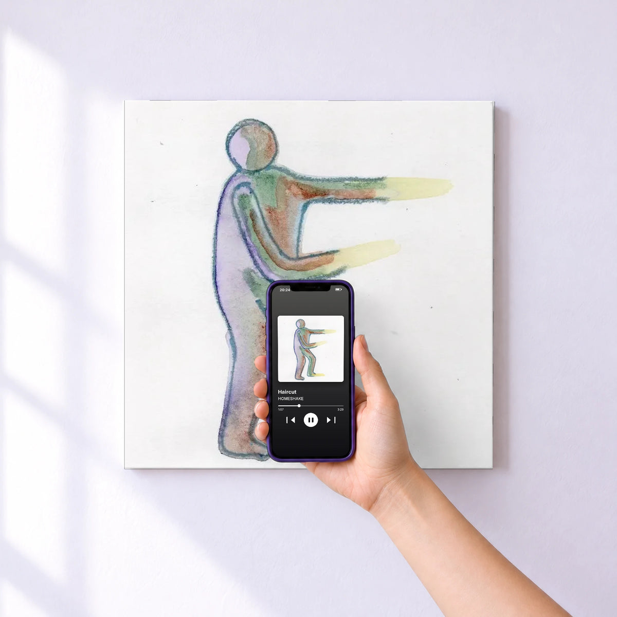 Affiche connectée Haircut de HOMESHAKE au mur : l'album se lance en approchant le téléphone