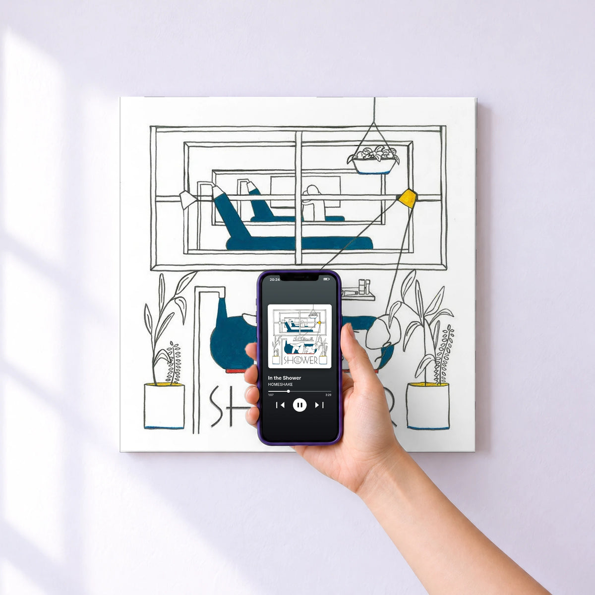 Affiche connectée In the Shower de HOMESHAKE au mur : l'album se lance en approchant le téléphone