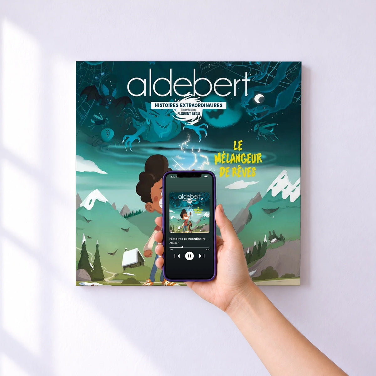 Affiche connectée Histoires extraordinaires : Le mélangeur de rêves de Aldebert au mur : l'album se lance en approchant le téléphone