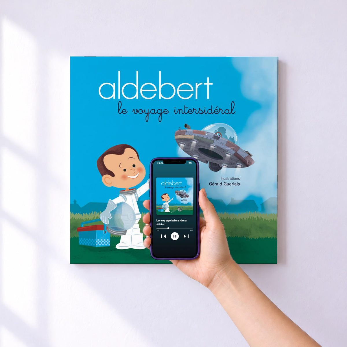 Affiche connectée Le voyage intersidéral de Aldebert au mur : l'album se lance en approchant le téléphone