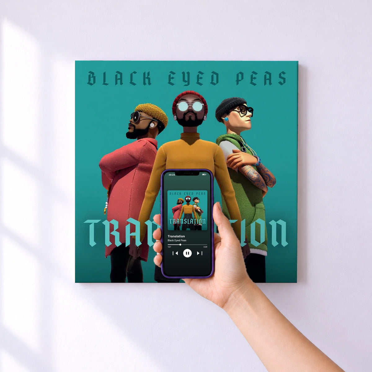 Affiche connectée Translation de Black Eyed Peas au mur : l'album se lance en approchant le téléphone
