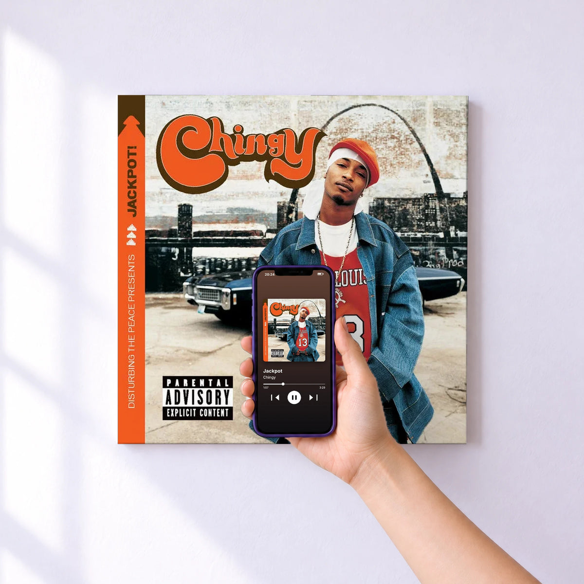 Affiche connectée Jackpot de Chingy au mur : l'album se lance en approchant le téléphone
