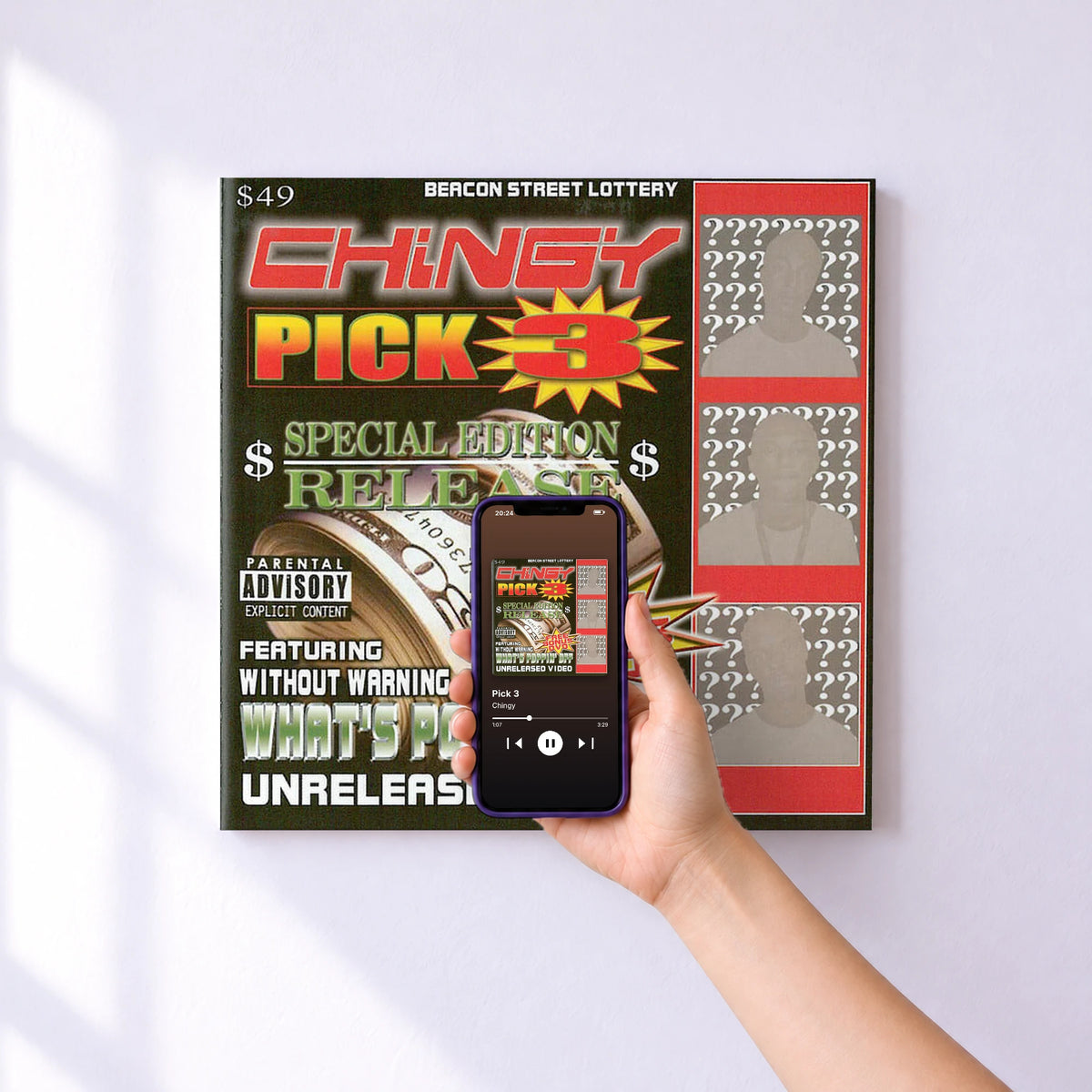 Affiche connectée Pick 3 de Chingy au mur : l'album se lance en approchant le téléphone