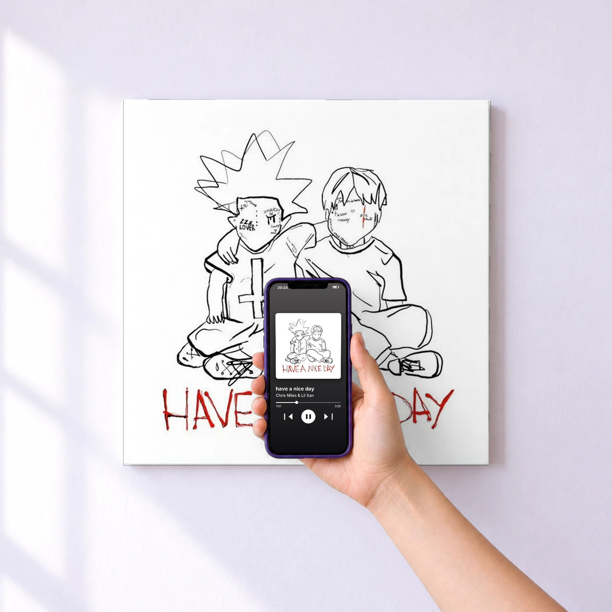 Affiche connectée have a nice day de Chris Miles & Lil Xan au mur : l'album se lance en approchant le téléphone