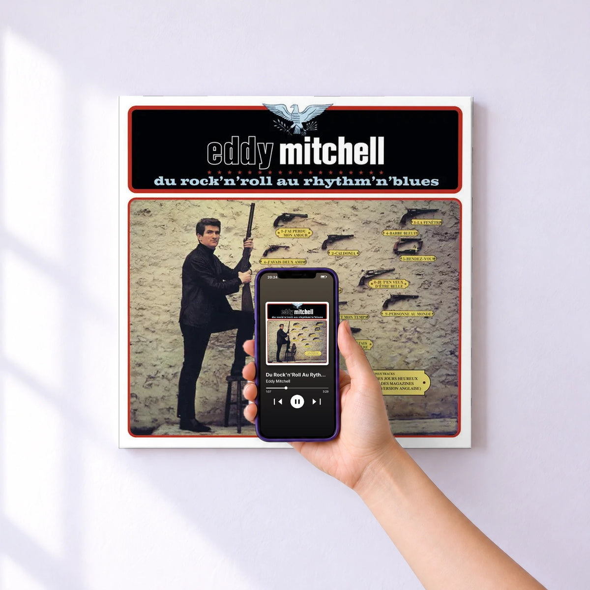 Affiche connectée Du Rock'n'Roll Au Rythm'n Blues de Eddy Mitchell au mur : l'album se lance en approchant le téléphone