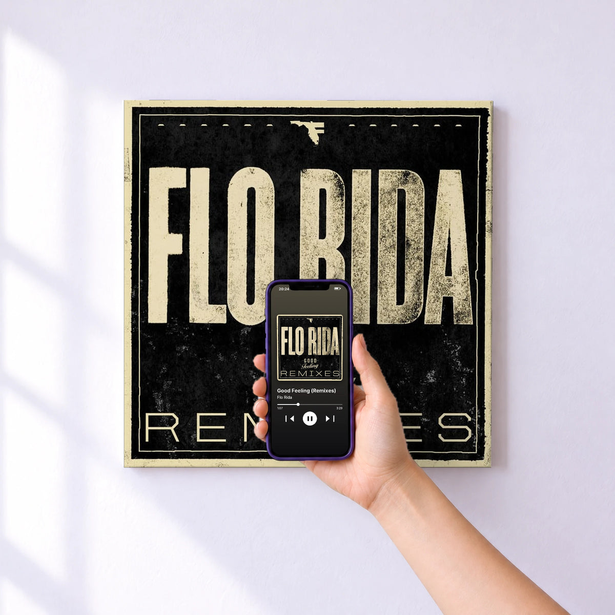 Affiche connectée Good Feeling (Remixes) de Flo Rida au mur : l'album se lance en approchant le téléphone