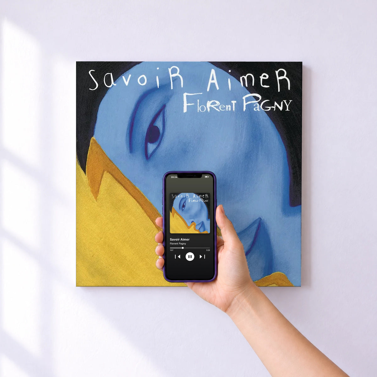 Affiche connectée Savoir Aimer de Florent Pagny au mur : l'album se lance en approchant le téléphone