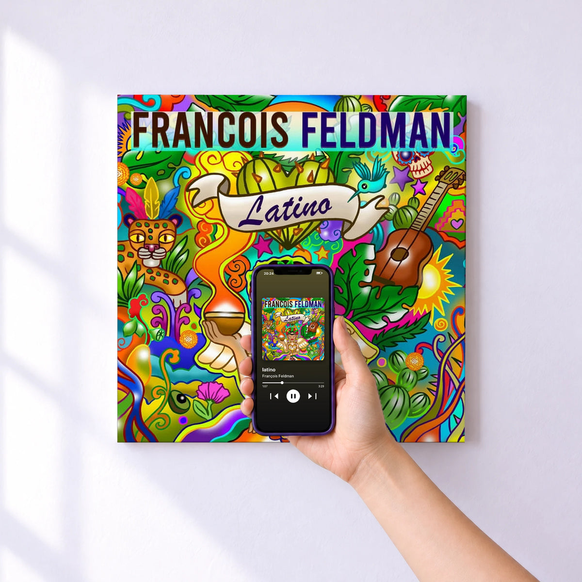 Affiche connectée latino de François Feldman au mur : l'album se lance en approchant le téléphone