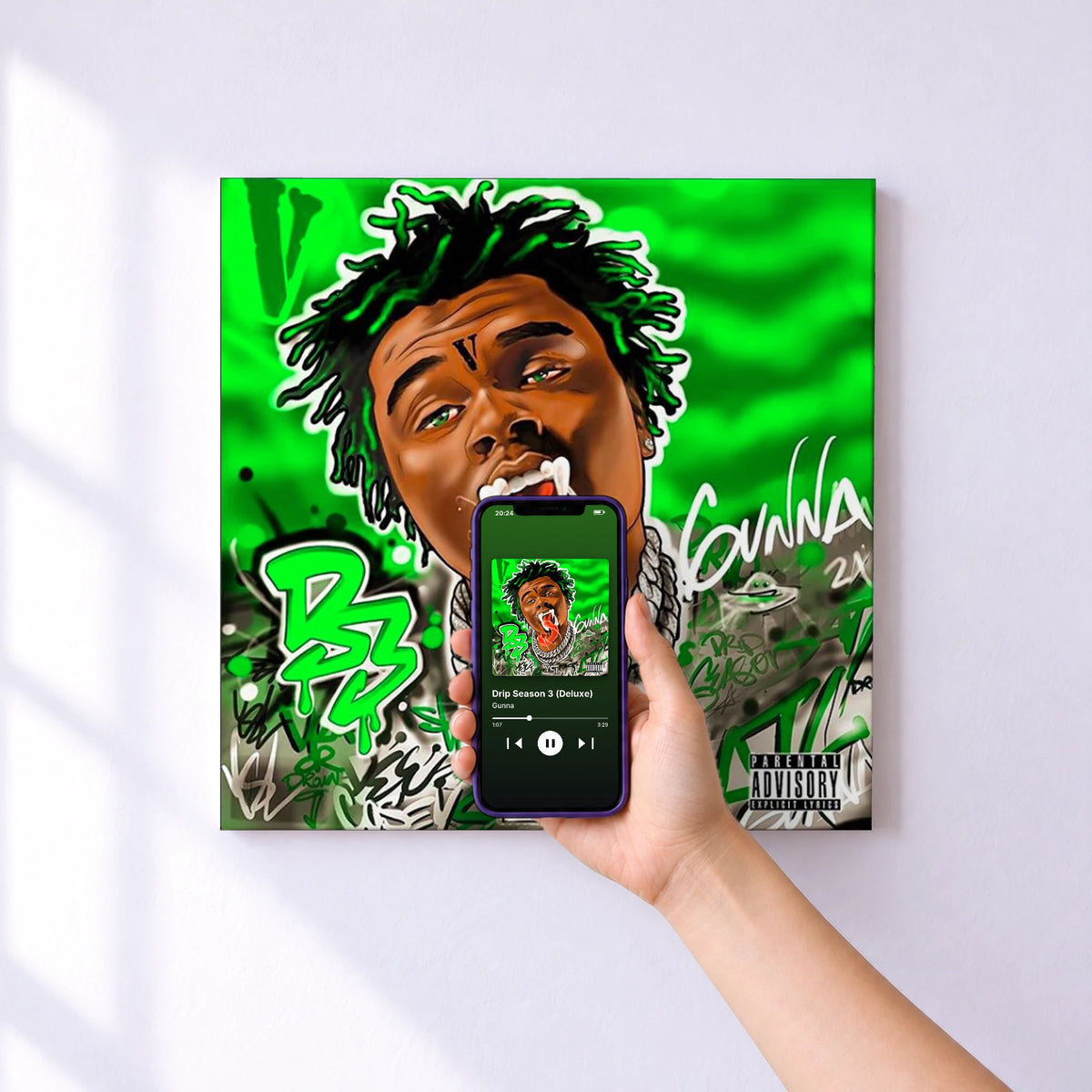 Affiche connectée Drip Season 3 (Deluxe) de Gunna au mur : l'album se lance en approchant le téléphone