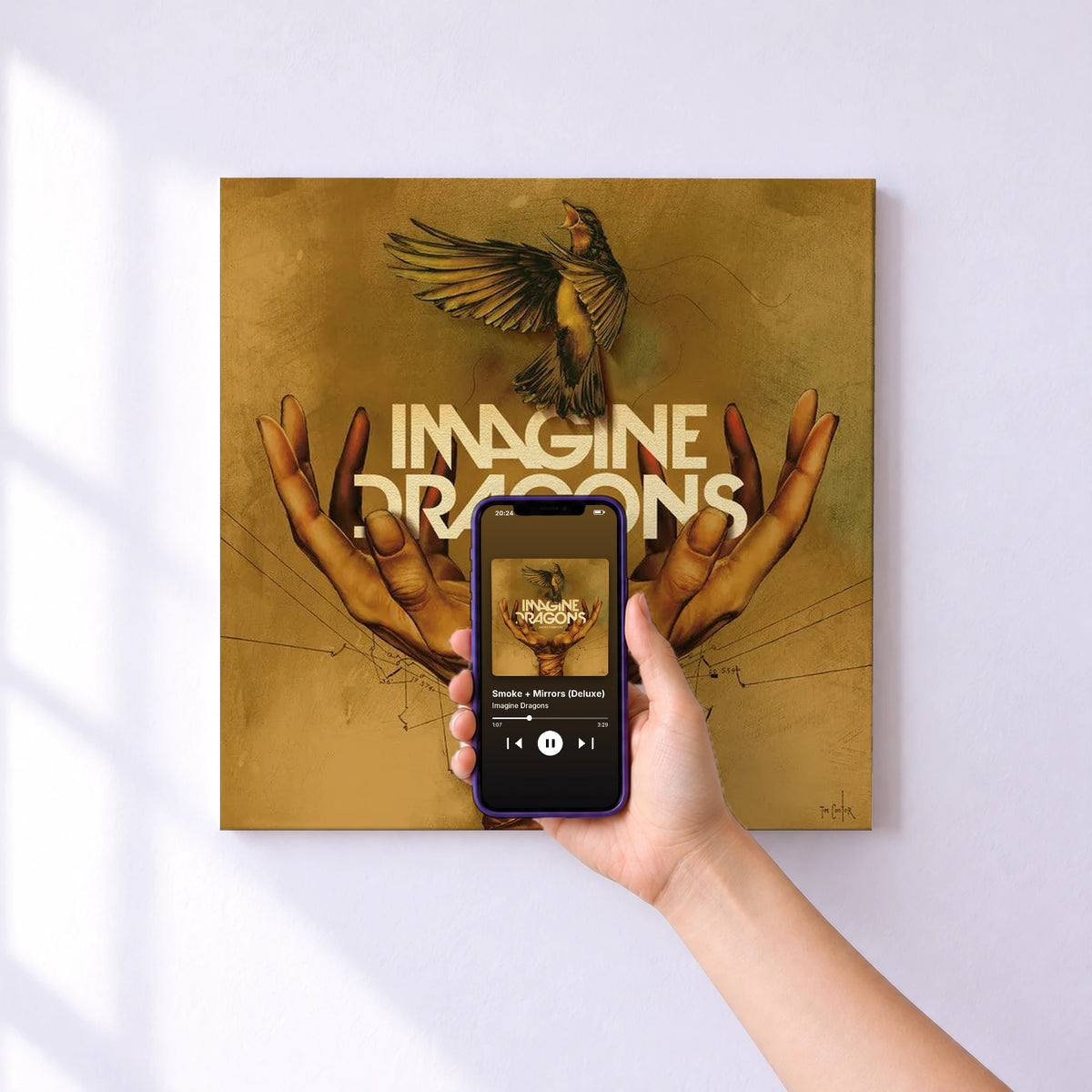 Affiche connectée Smoke + Mirrors (Deluxe) de Imagine Dragons au mur : l'album se lance en approchant le téléphone