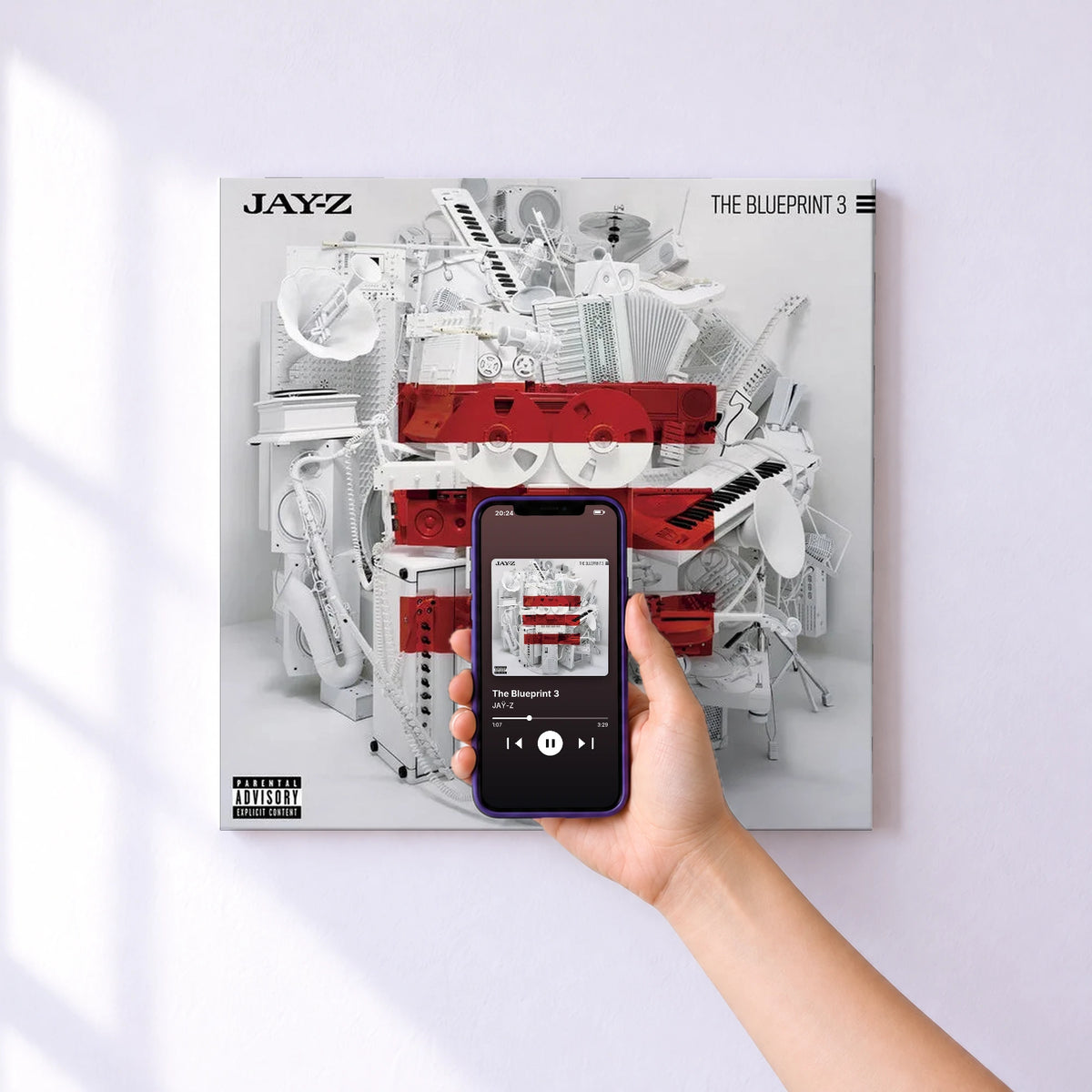 Affiche connectée The Blueprint 3 de JAŸ-Z au mur : l'album se lance en approchant le téléphone
