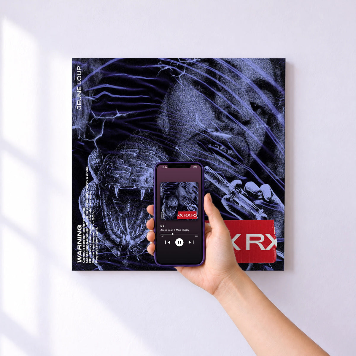 Affiche connectée RX de Jeune Loup & Mike Shabb au mur : l'album se lance en approchant le téléphone