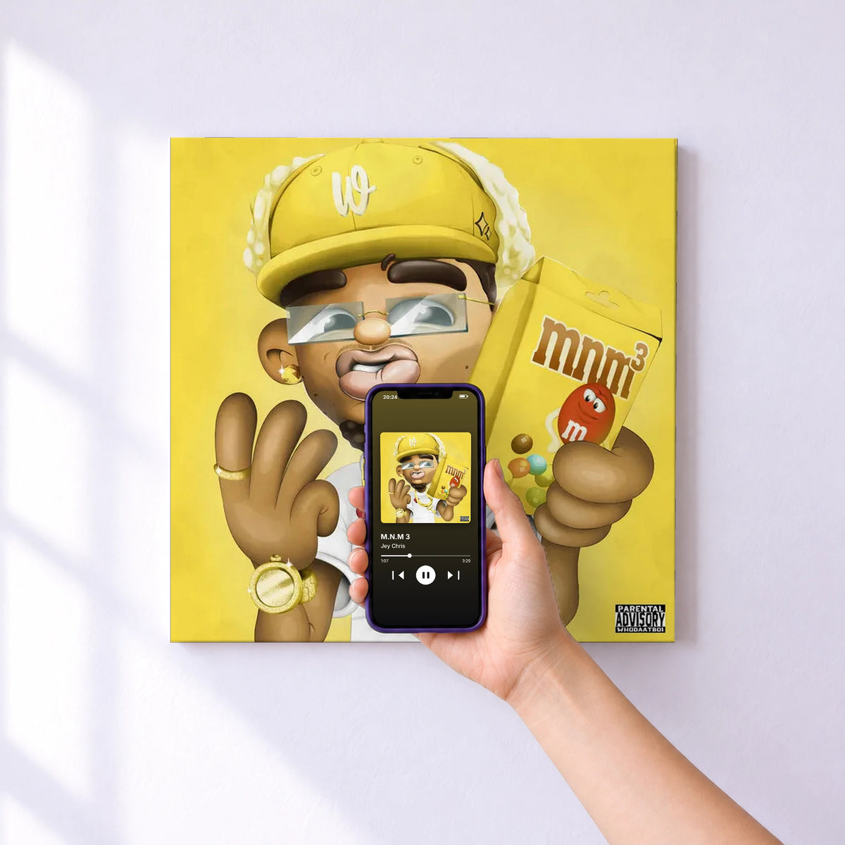 Affiche connectée M.N.M 3 de Jey Chris au mur : l'album se lance en approchant le téléphone