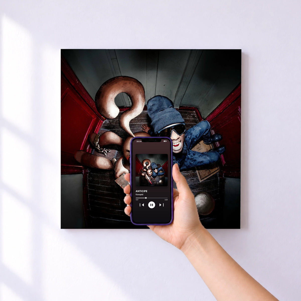 Affiche connectée ANTICIPE de Keeqaid au mur : l'album se lance en approchant le téléphone