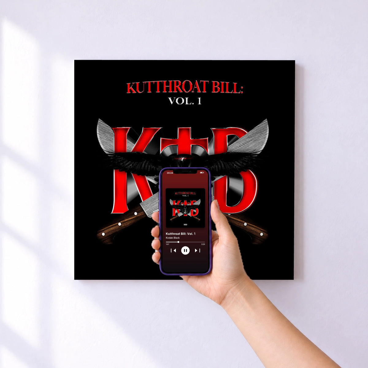 Affiche connectée Kutthroat Bill: Vol. 1 de Kodak Black au mur : l'album se lance en approchant le téléphone