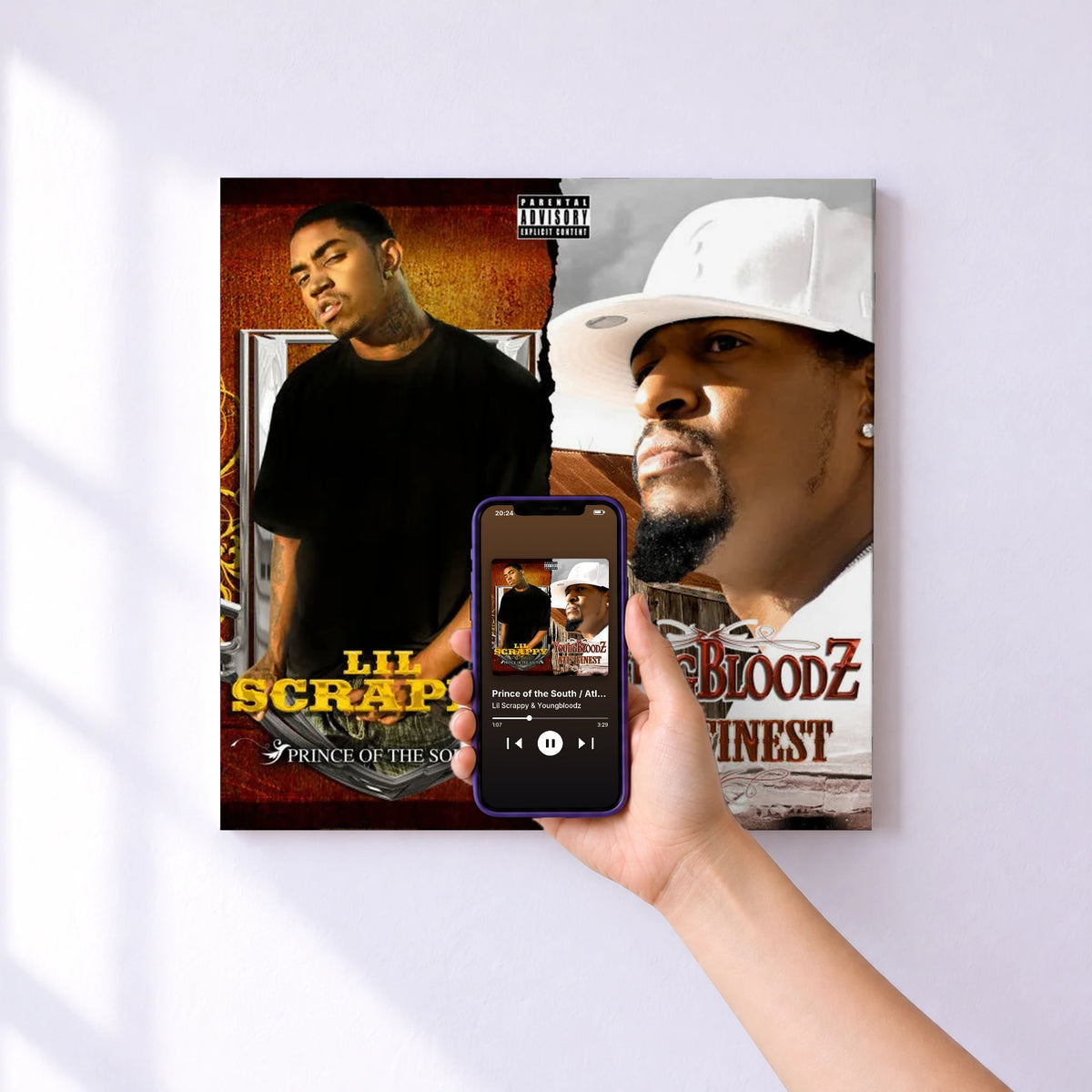 Affiche connectée Prince of the South / Atl's Finest (2 for 1: Special Edition) de Lil Scrappy & Youngbloodz au mur : l'album se lance en approchant le téléphone