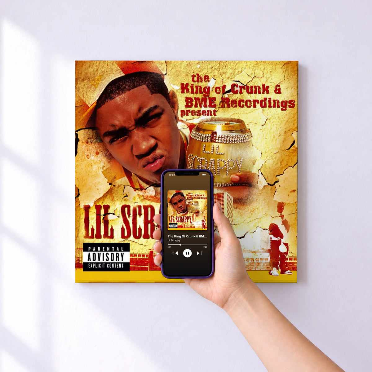Affiche connectée The King Of Crunk & BME Recordings Present: Lil Scrappy de Lil Scrappy au mur : l'album se lance en approchant le téléphone