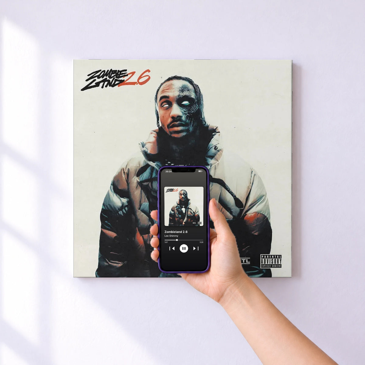 Affiche connectée Zombieland 2.6 de Loe Shimmy au mur : l'album se lance en approchant le téléphone