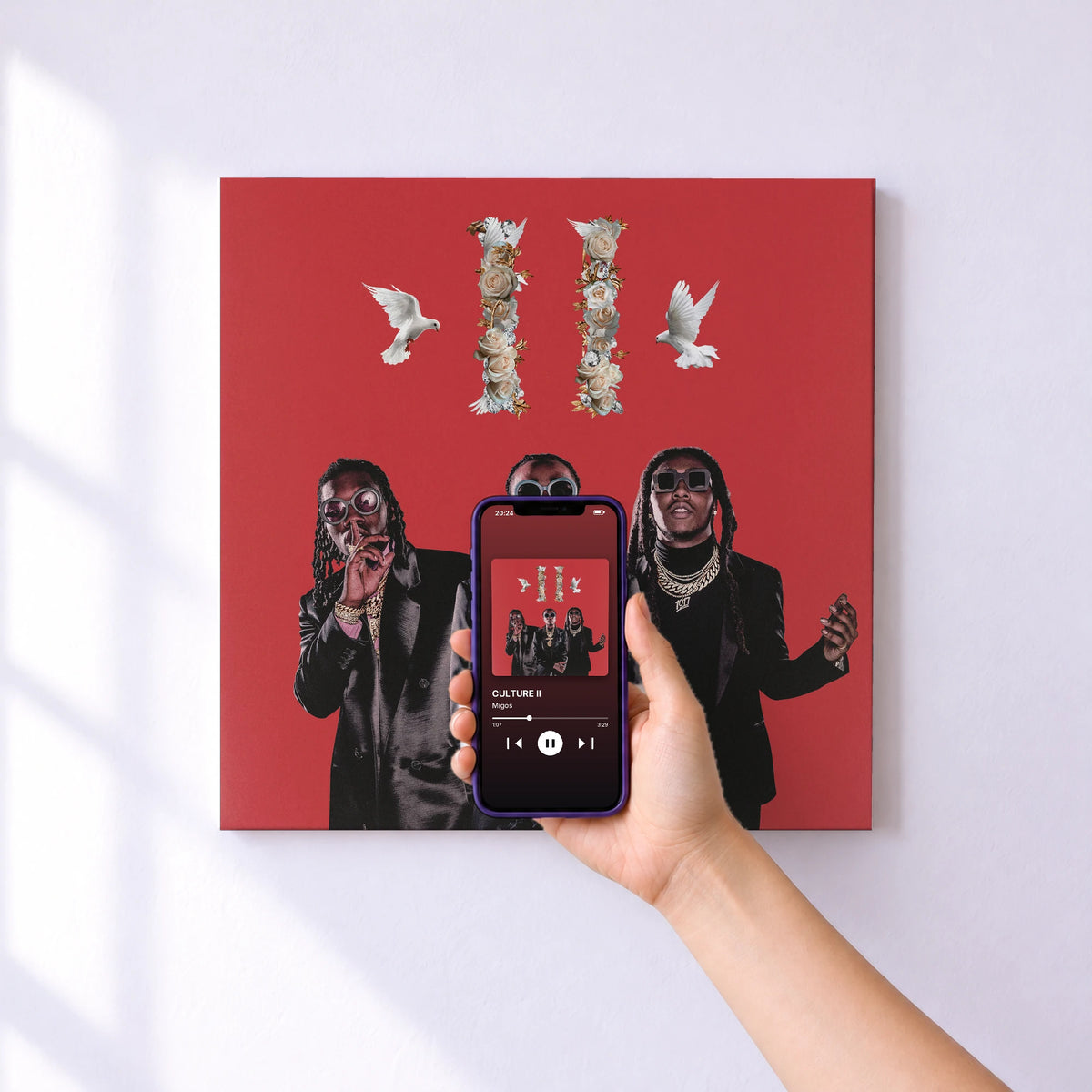 Affiche connectée CULTURE II de Migos au mur : l'album se lance en approchant le téléphone