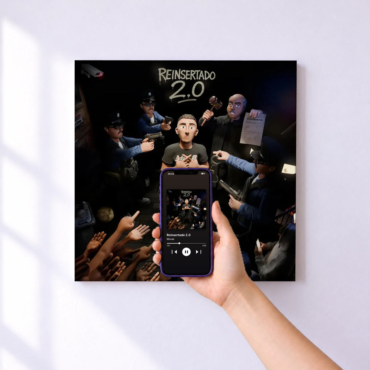 Affiche connectée Reinsertado 2.0 de Morad au mur : l'album se lance en approchant le téléphone