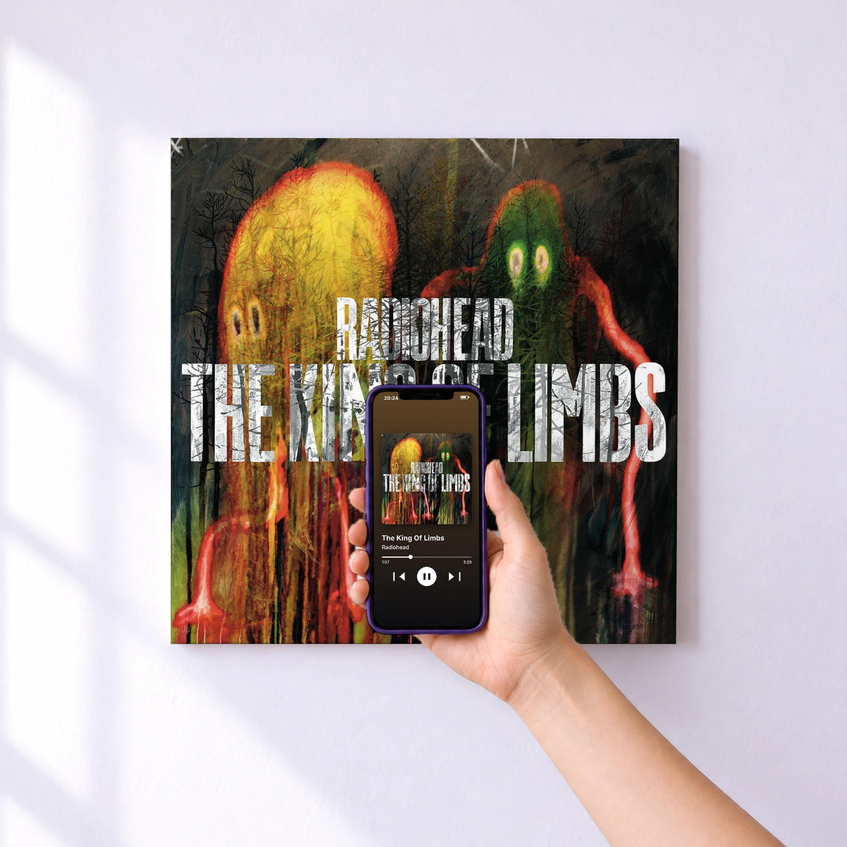 Affiche connectée The King Of Limbs de Radiohead au mur : l'album se lance en approchant le téléphone