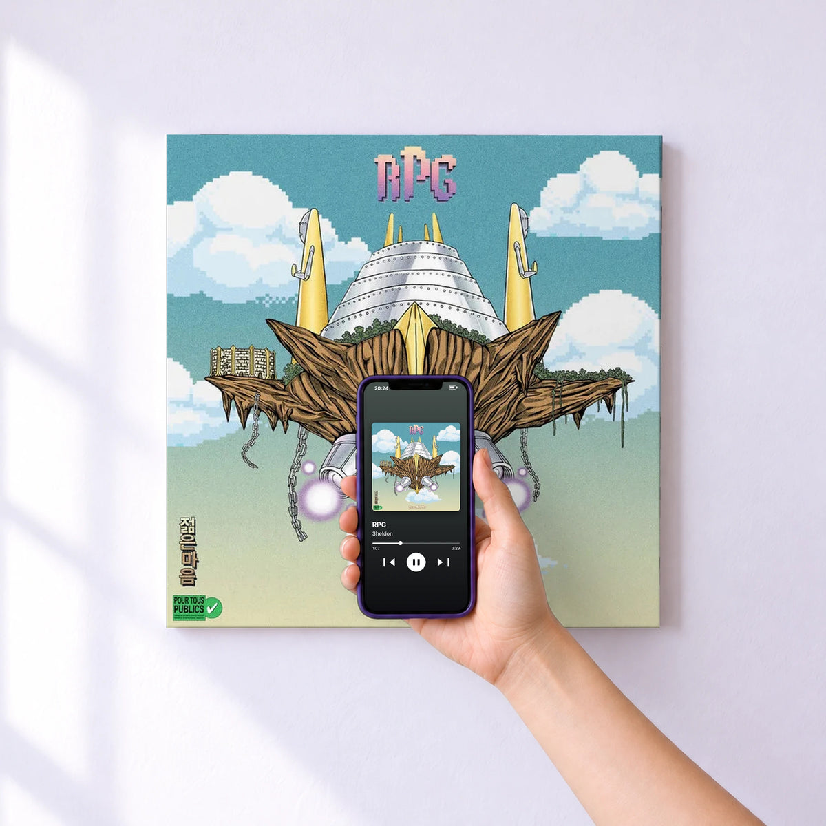 Affiche connectée RPG de Sheldon au mur : l'album se lance en approchant le téléphone